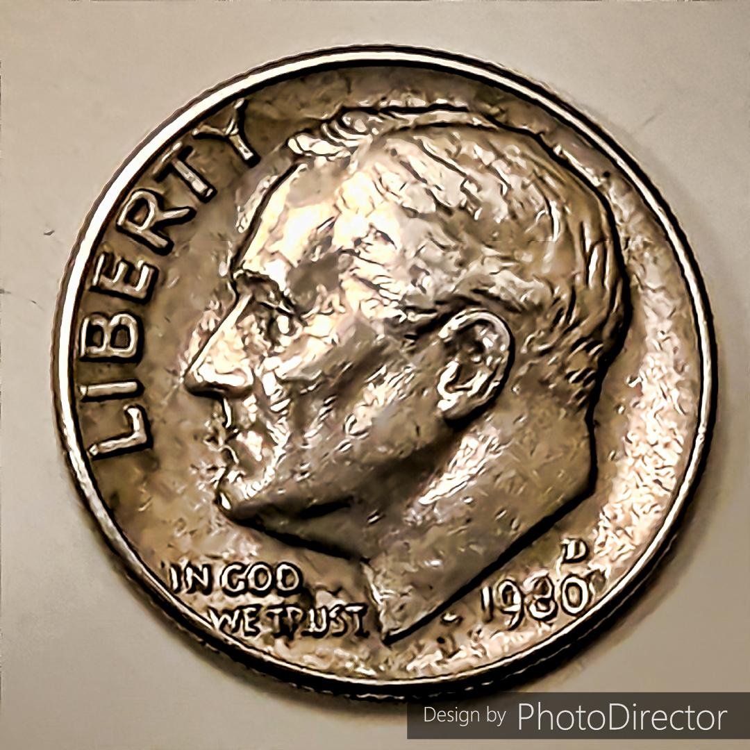 A close-up of a U.S. 10 cent piece, commonly referred to as a dime.