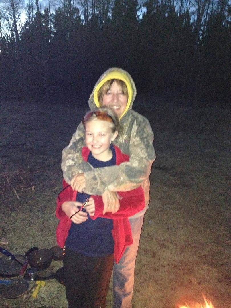 My youngest granddaughter by the camp fire
