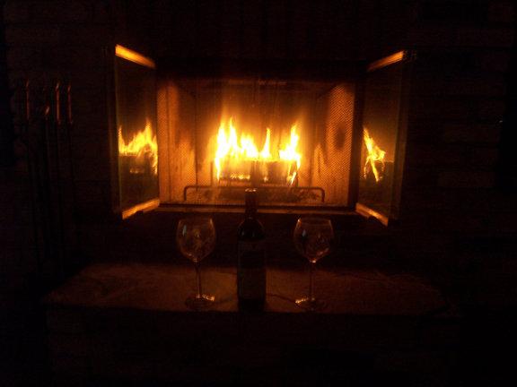 Ok it is cold here for the last few nights. he is my fireplace with a warm fire and good bottle of wine......hmmmm what am i missing.... :-) .....keep warm all .....