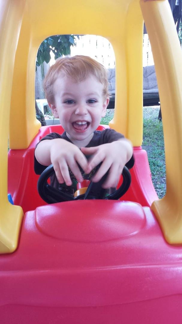 Eli loves his car!