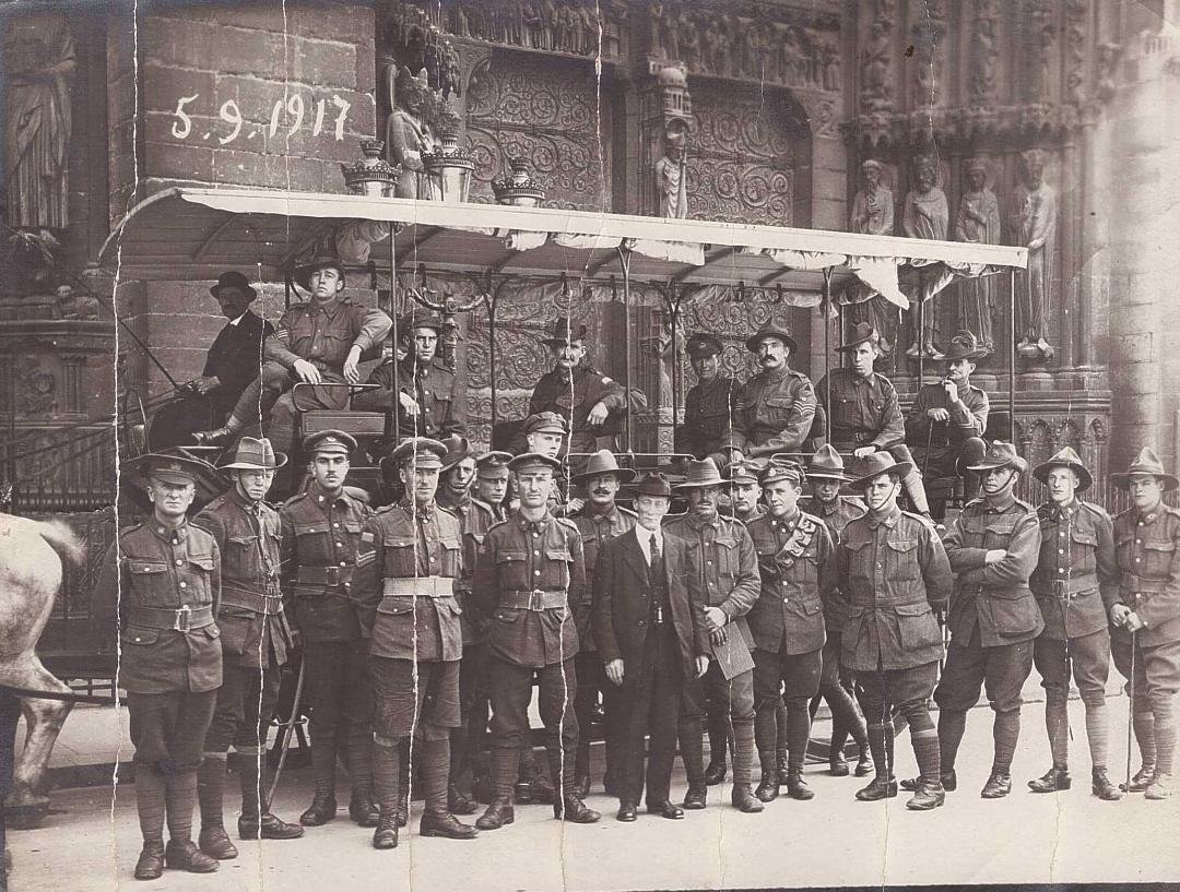 Stamp on back from Photo Animee, 25 Rue d'Amsterdam, Paris, Sept 5, 1917. Uncle Jim is 4th from left front row.