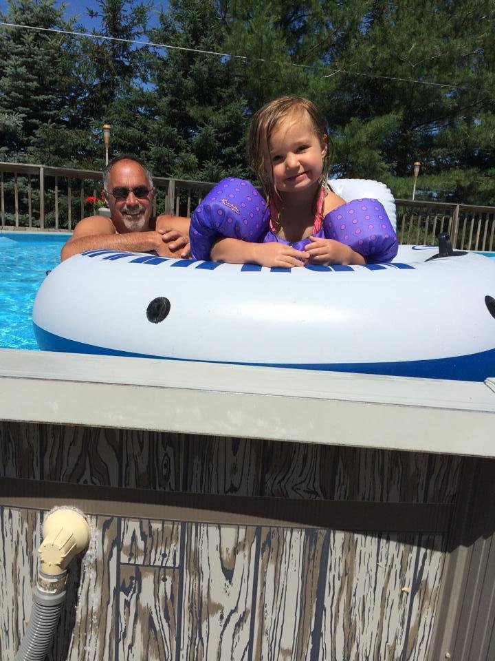 Papa and keira playing in the pool
