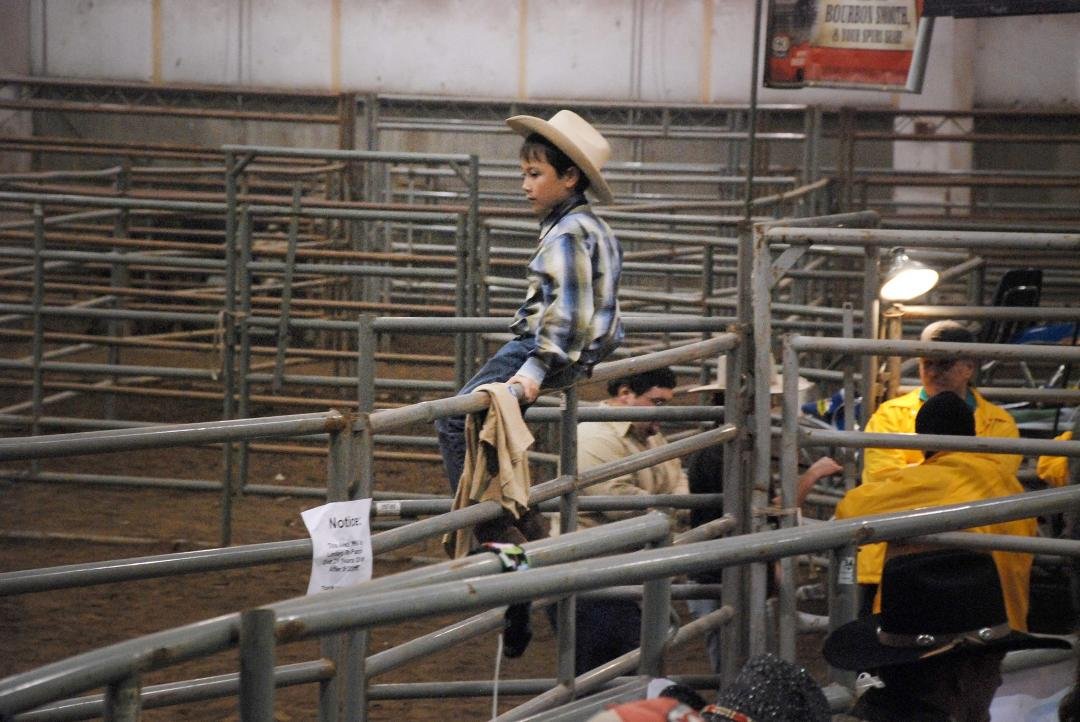 Here's one for Turnback Tuesdays. My little buckaroo on the panels before the bullriding. The event itself, he's not bullriding. 😂
