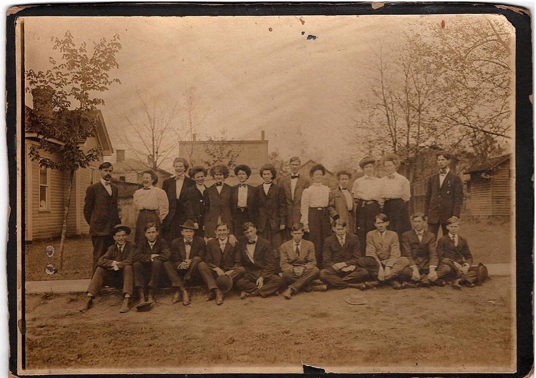 Here is an interesting family picture I have found. This is my Grandpa Knapp.(Far right side in the bow tie!) I am told this is either a picture of him with his graduating Normal School class or a picture of him as a young