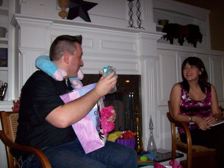 Manderson playing with the new toys at the baby shower