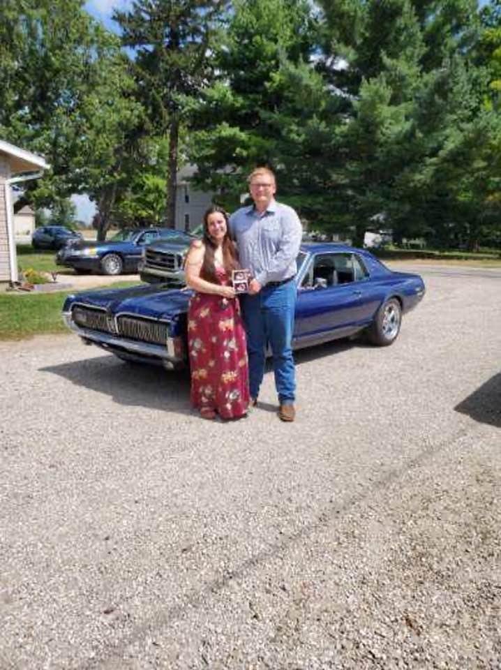 Grandson and his wife.  It’s a girl.