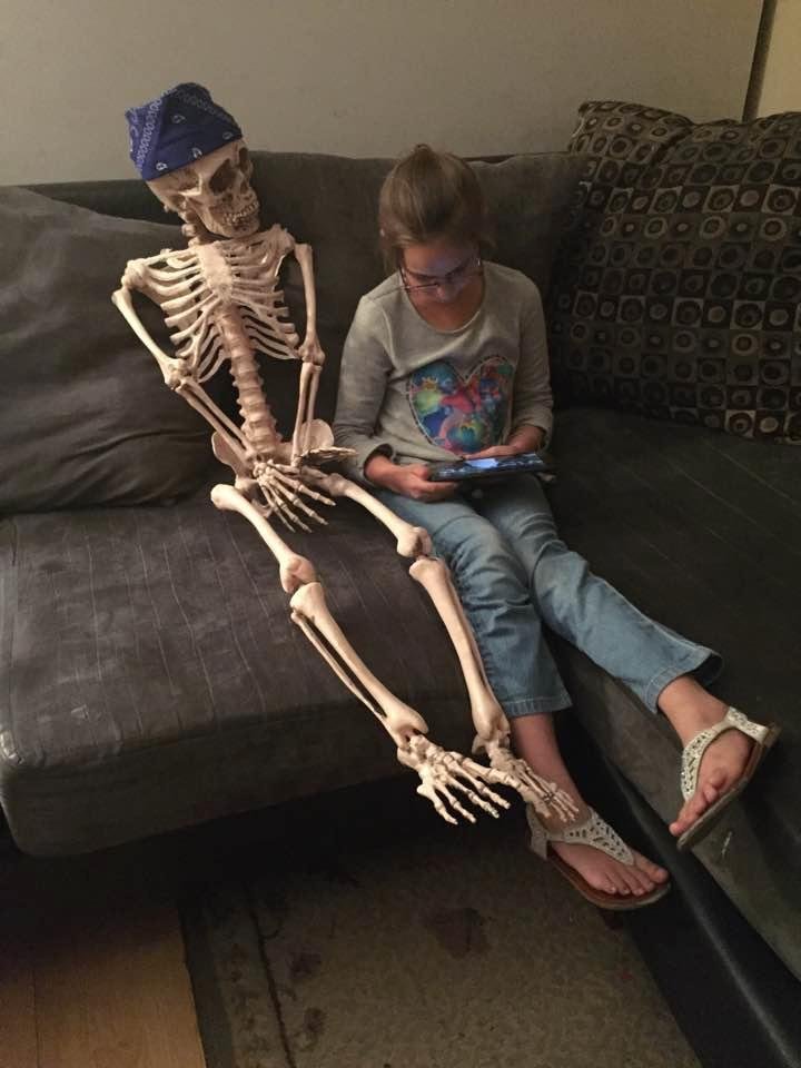 My granddaughter Haley is teaching Melvin how to use her tablet!