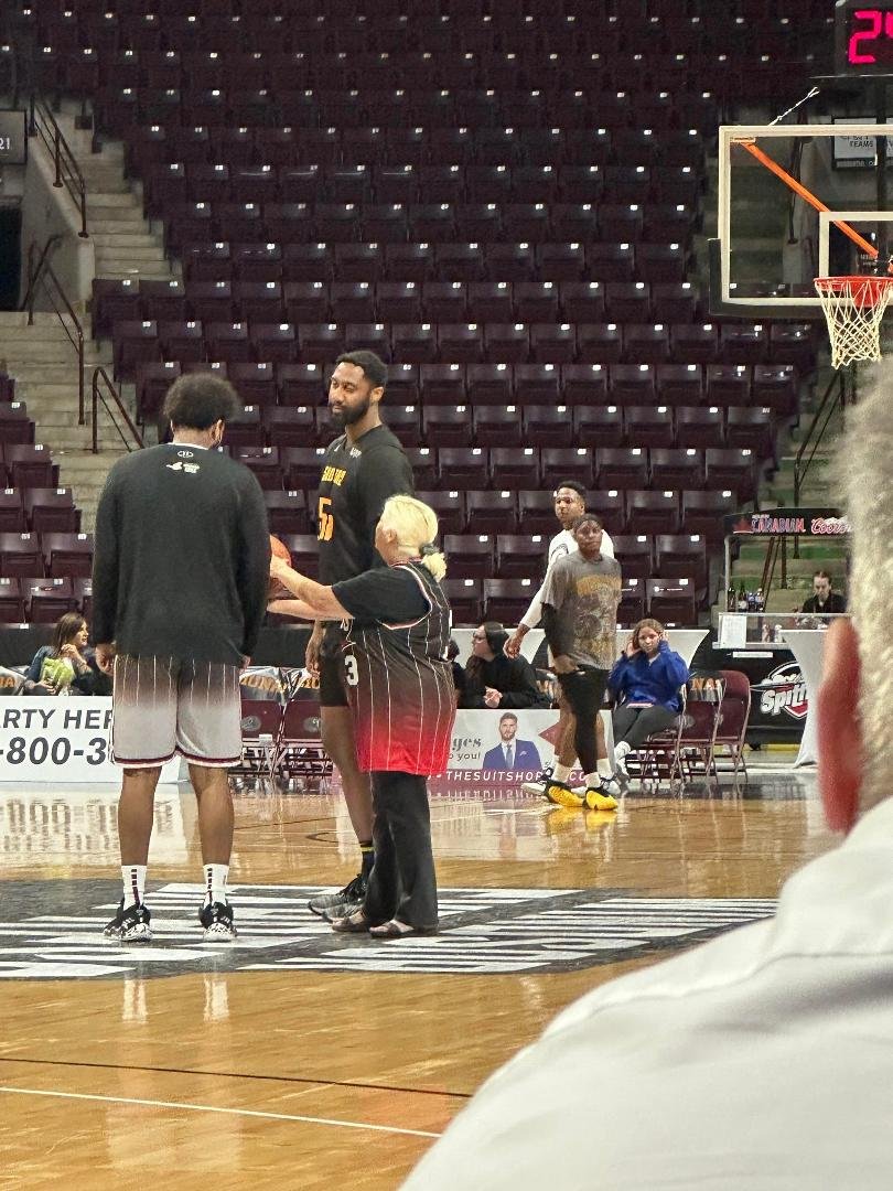 Lois was very busy at the Express game.
"Quit your arguing or I'll make you both sit down on the bench".