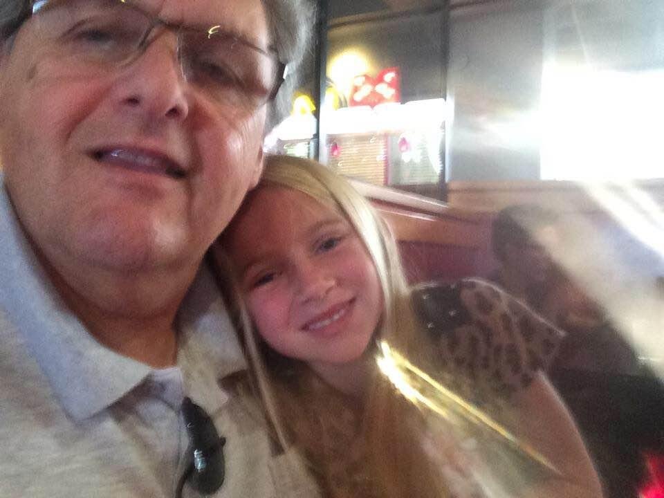 Papa Ron and my lovely Granddaughter Emma enjoying our annual Happy Birthday meal at Red Robin..........she likes RR because they sing to her and she gets a free hot fudge sundae!!! Love that girl sooooo much!!! Isn't she g