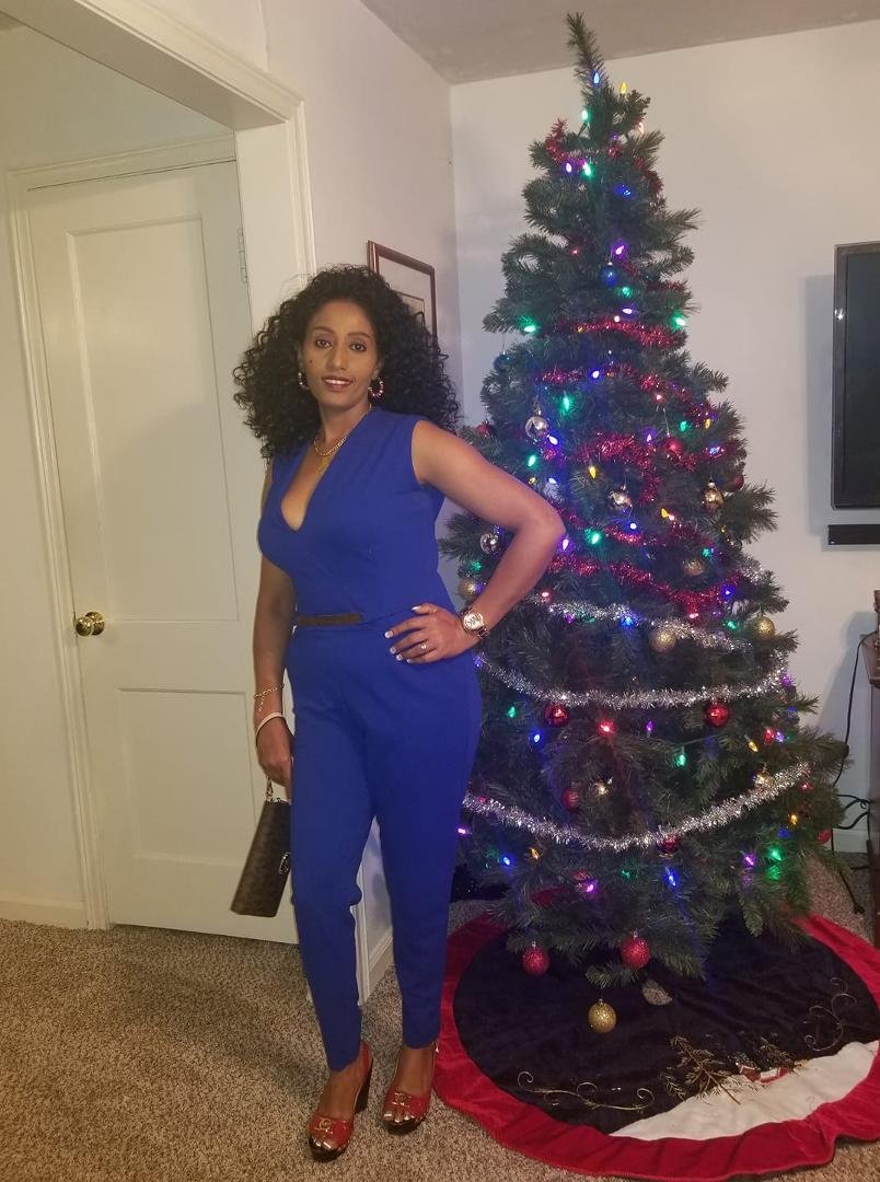 My beautiful wife Smret Walker going to Christmas party .