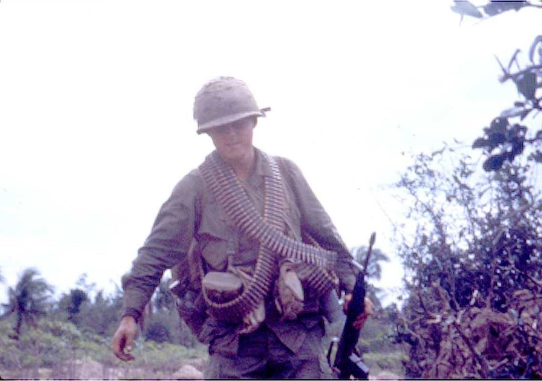 I think we called him PU
Ammo  bearer for M60
Each gunner had 2 of these guys.
One of them had a extra barrel and sometime a ammo can with more ammo.(not a fun Job