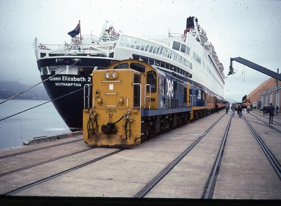 Getting ready to go on a shore excursion - Dunedin, New Zealand. You guess right, if you figured that I DIDN'T go shopping in this port. - January 1992