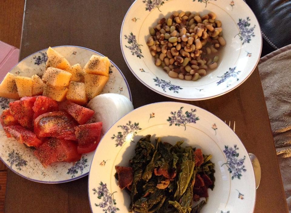 Sunday dinner mustard greens, purple hull peas,cantaloupe and fresh tomatoes don't get no better than that