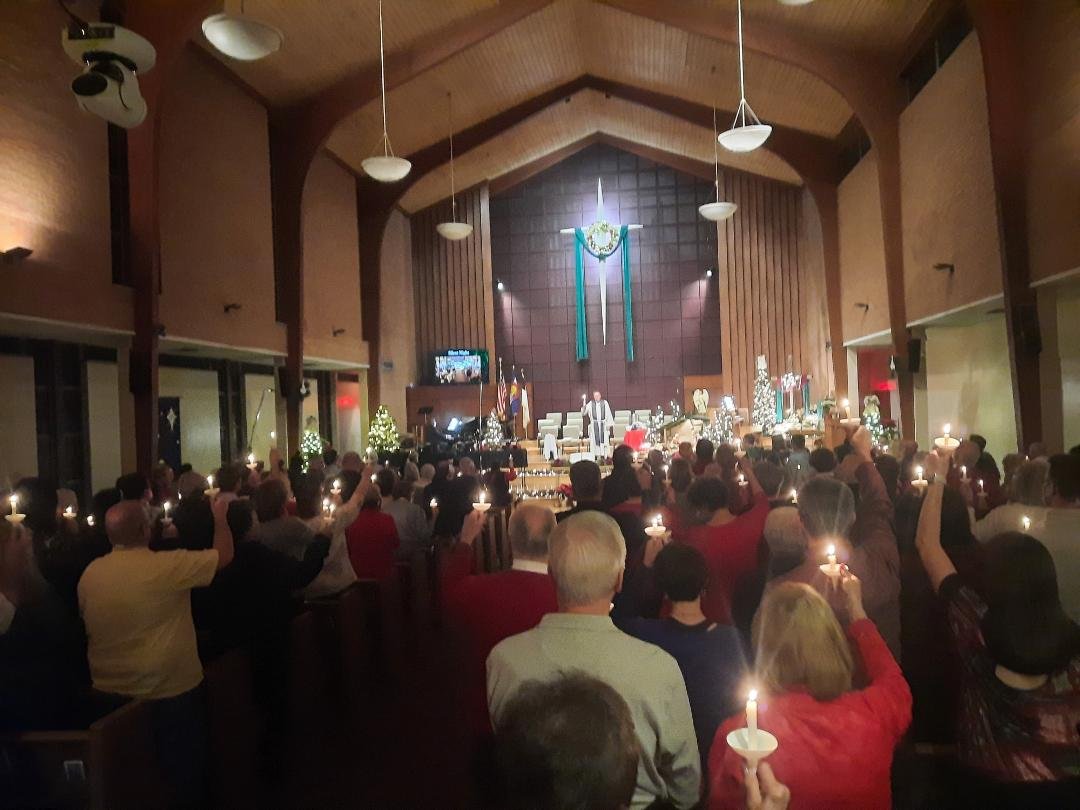 Christmas Eve Service closing with candle lighting & singing Silent Night... Merry Christmas all from Greeley, CO...