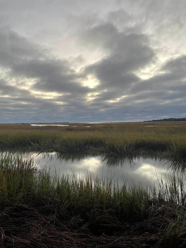 55° Cloudy Reflections on our Atlantic Salt Marsh from our lower deck at Murrells Inlet University where Eagleship is a way of Life … Join us in our Quest: whittemorehistorical.org in Historic Conway founded in 1732