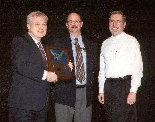 2001 award ceremony (for my work on pilots and age). From the left, the FAA Federal Air Surgeon, me, and Dave Schroeder, my division manager