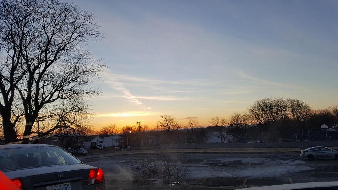 The sun just peeks on the horizon at Tim's drive through this morning. Spring's on the way!!
