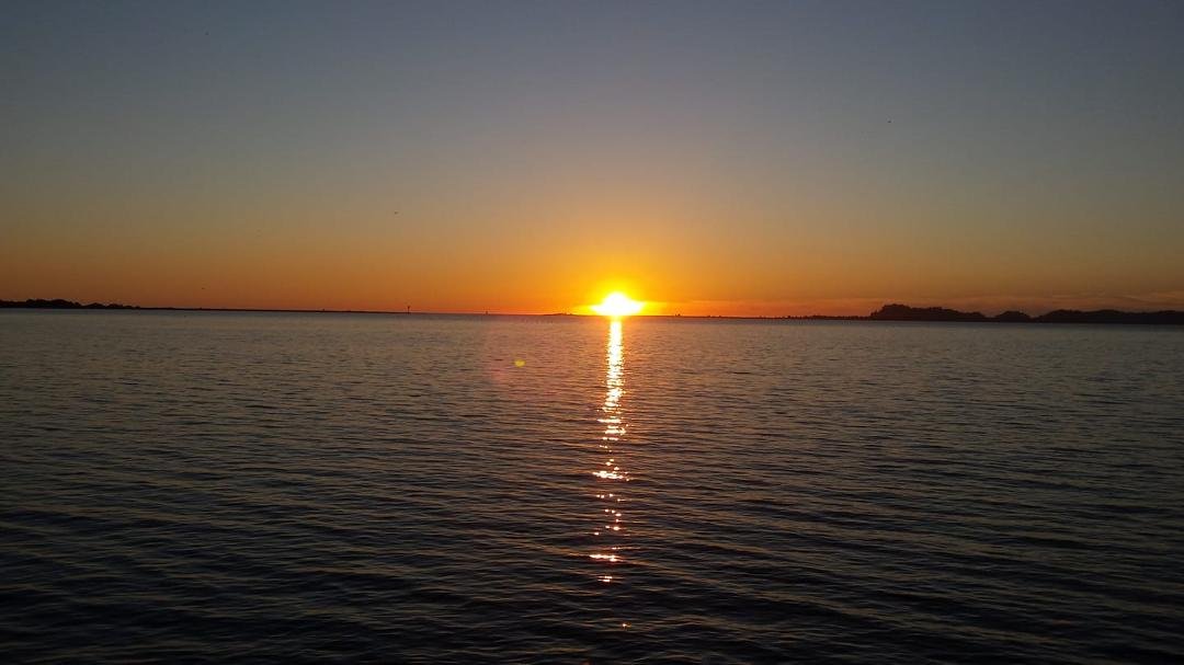 Sunset on Cherry Street. Jer and Jody sitting on the rocks.. End of a Nice Day☺☺☺