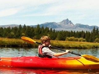 Enjoying Labor Day in Central Oregon on a beautiful End of Summer Day.  Cole on Lake Sun River, Three fingered Jack in the back ground.