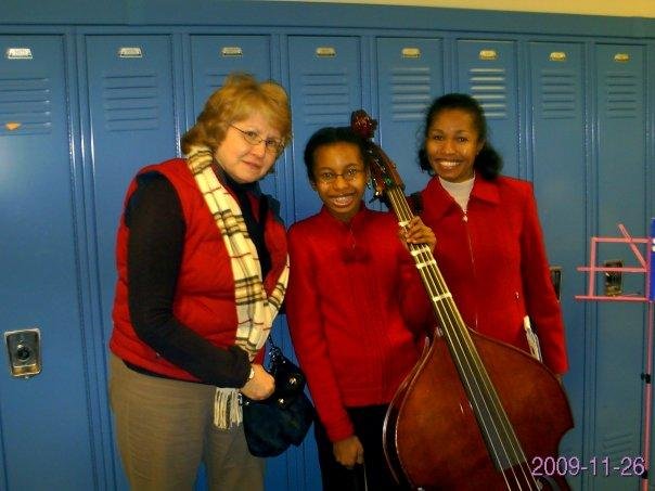 Candice posing with Mrs. Remming (Brighton schools orchestral conductor) and her mother, Andrea, at E. Irondequoit's Solofest (1/30/10).