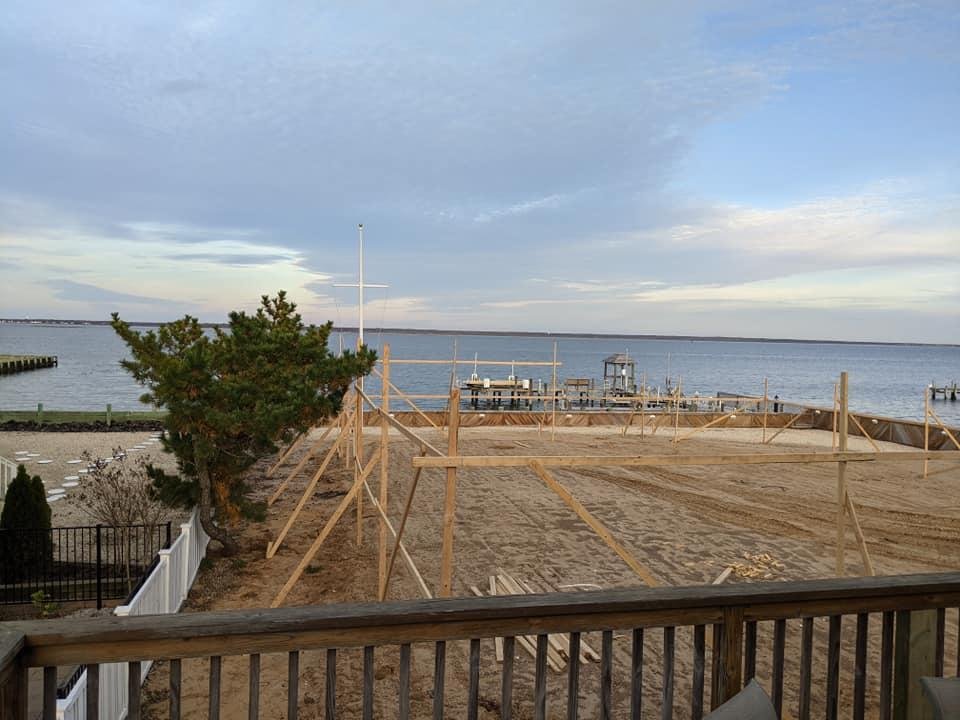 Just before Thanksgiving a crew finally arrived to set up later boards and lines for the piers for the new 4200 sf house that will affect our idyllic temporary home.
