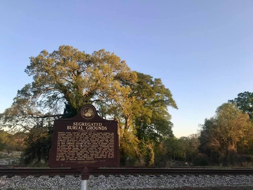 A little history lesson in our cemetery walk highlighted as the sun crested the horizon this morning.
