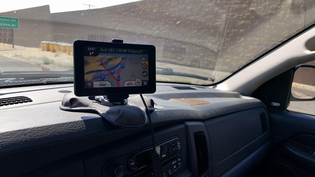 Took this while driving. Not very good. I was trying to get the road sign which says "Wilmington, NC 2,554 miles. That is the length of I-40. Starts (or ends) in Barstow, .CA at I-15.