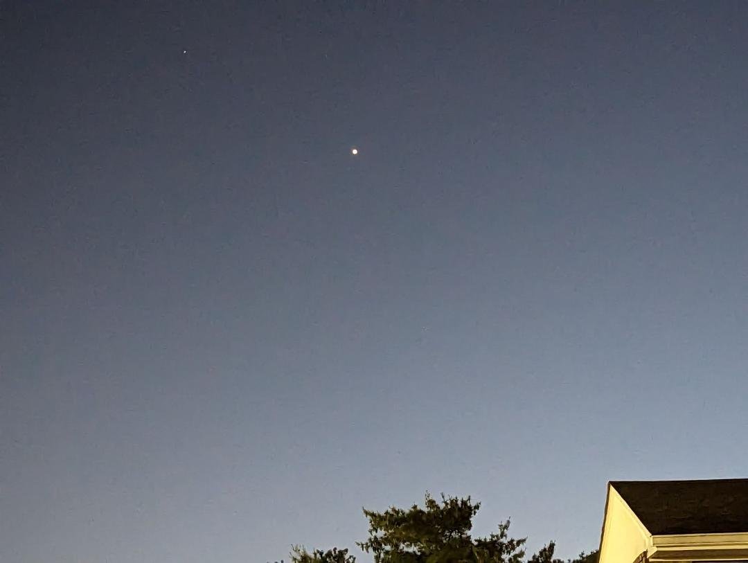 I've been noticing that Venus has been visible just after sunset above the western horizon since at least March. If you look to the west around 9:00 PM or so, Venus is the bright "star". In this image, my cell phone camera
