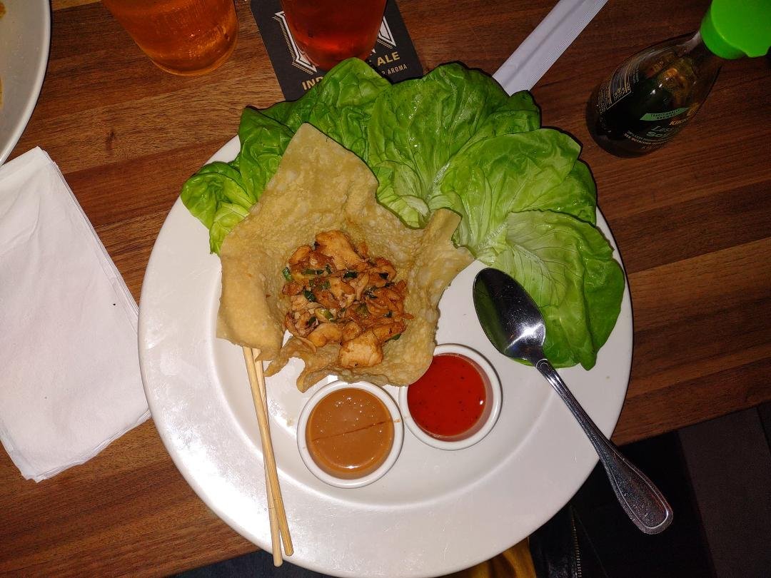 Chicken lettuce wraps with 2 different sauces...I prefer the peanut sauce.