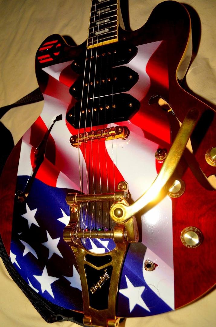 My Epiphone needed some customization so I added a skin to her, she's definitely one of a kind now !!!