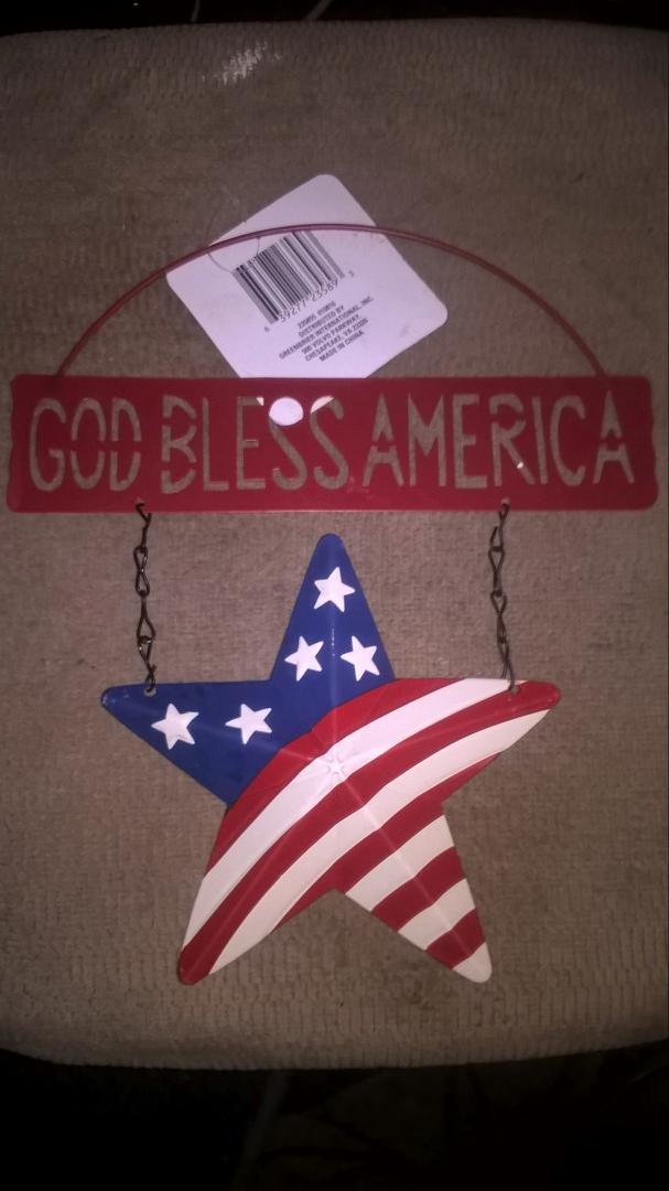 GOD BLESS AMERICA made in china kind if bothers me are flags are made there also