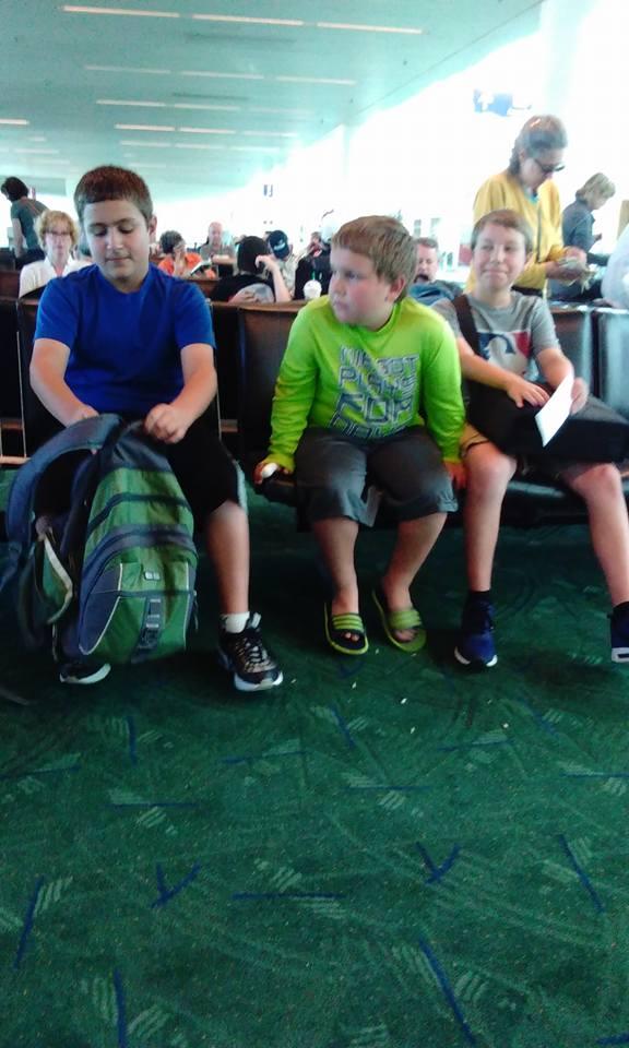 At the airport with my grandsons