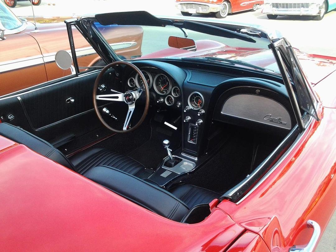 Cruise Night in Palm Desert. Boys and thier toys. The "64" vette showed well. Red was in!!!