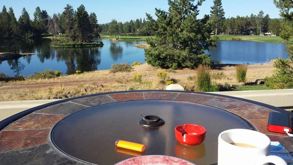 Monday morning coffee on the deck by the lake in Sunriver