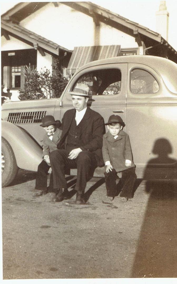 TBT: This is a 1936-year throwback of my uncle Sim on the left and my dad on the right. I don't know the guy in between. I would love to have that car, though.