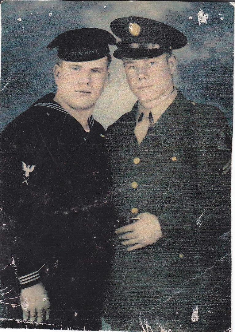 My dad on the left and an unknown soldier World War II