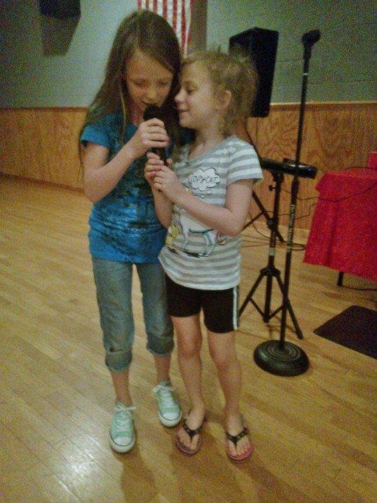 My granddaughers Ruby and Lily doing karaoke at the Fort Worth Elks Lodge. The are singing "Before He Cheats". I was so enthralled, I didn't think to take a video.