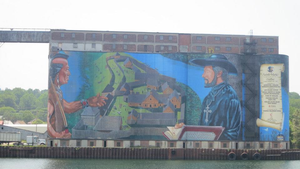 Giant mural painted on grain elevators in Midland harbour