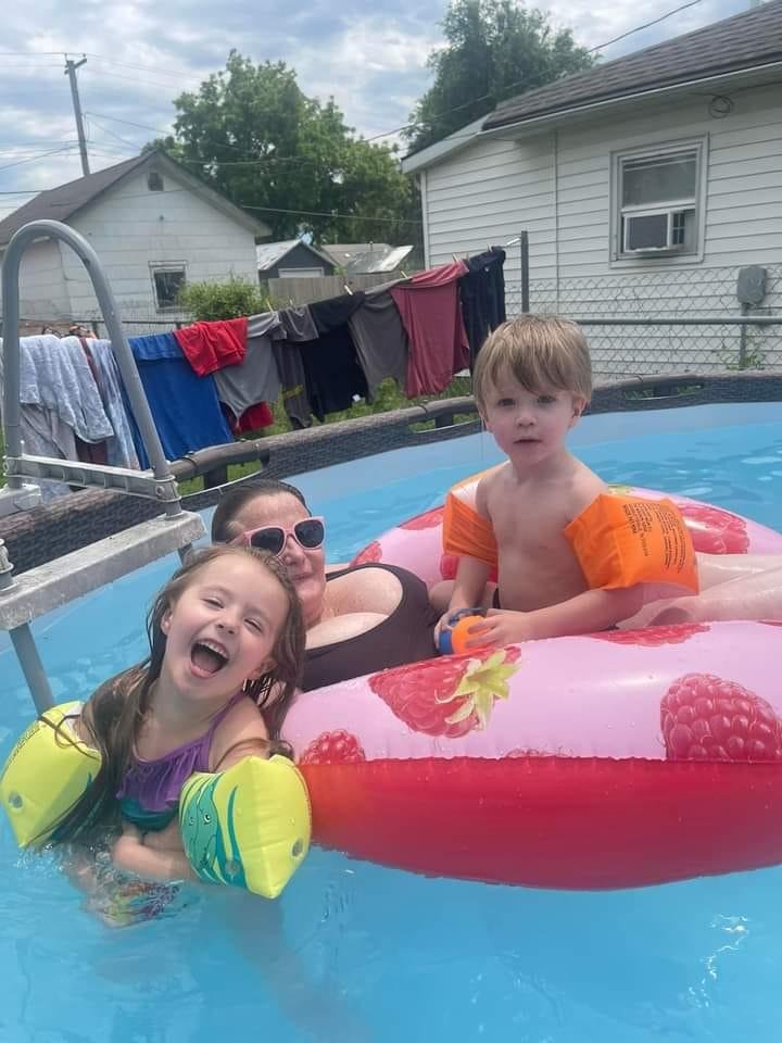 2 of my Grandkids swimming with their Auntie. Fun fun fun!!!!!