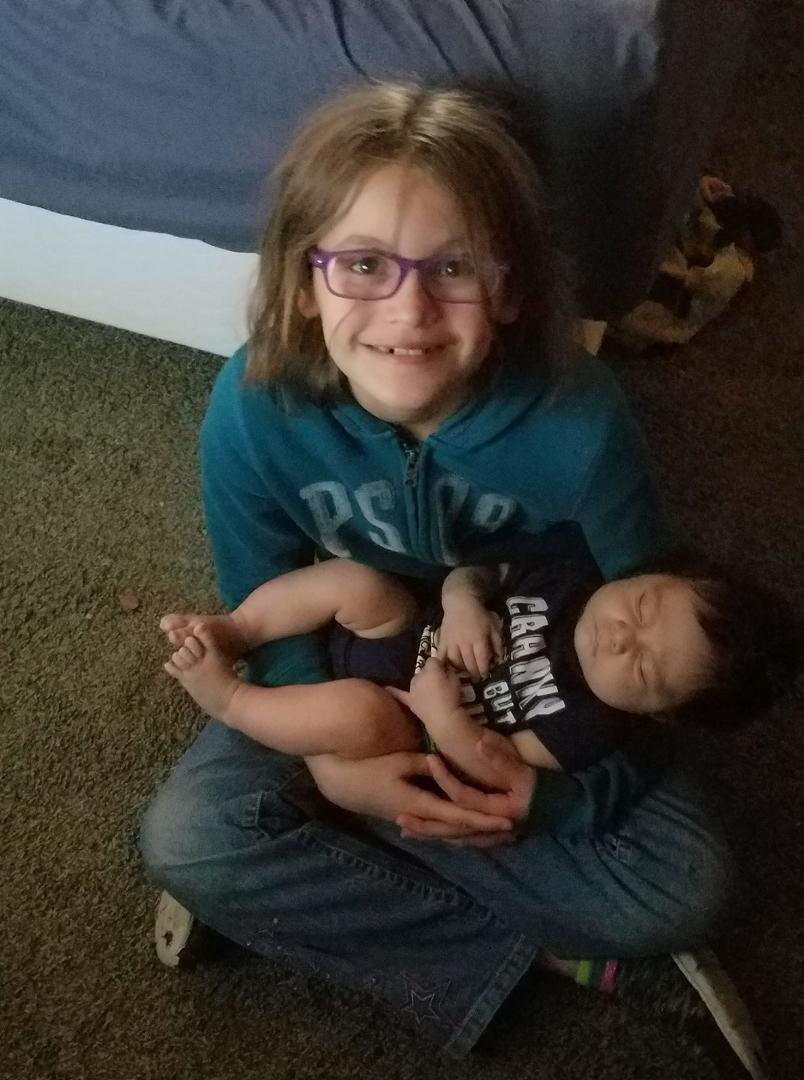 What a good big sister!