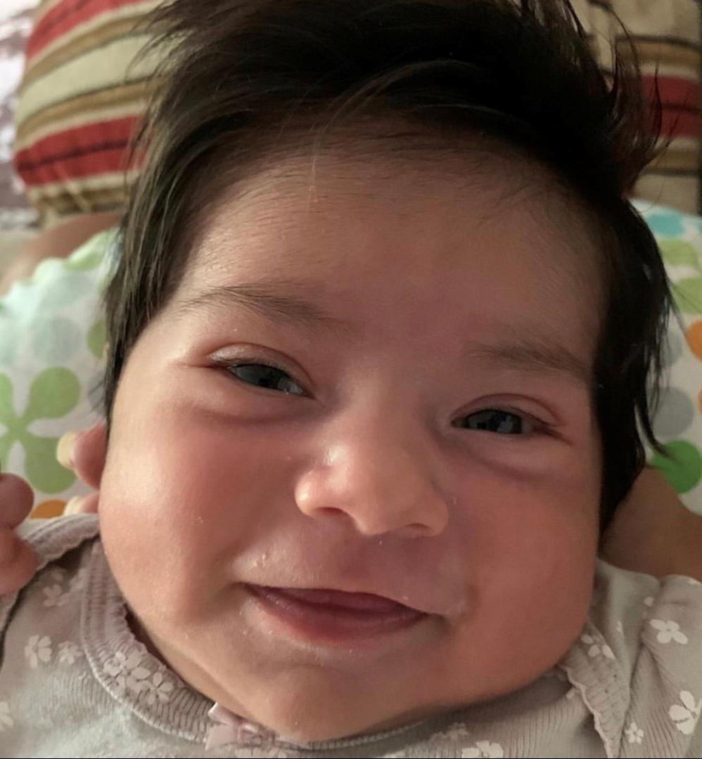My new niece with a smile.