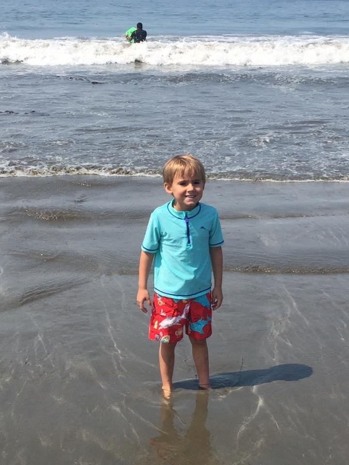 Gibson at the beach today with his Mommy and sister. He says the water is cooold!