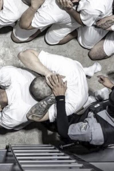 Senator Van Hollen being welcomed to El Salvador prison.