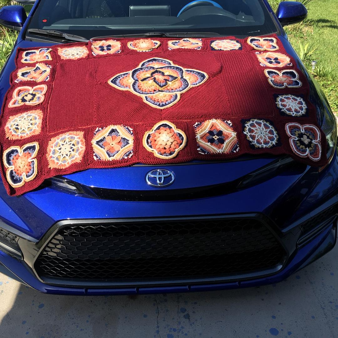 Just finished the Morrocan blanket minus tassels. It took about two weeks to complete and that includes all the blocking of the squares. I am loving this blanket