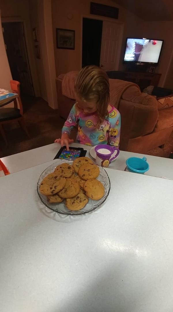 Nothing like making making chocolate chip cookies for your Grand Daughter and a cup of milk when Mom's not home.