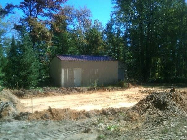 Pretty exciting. Our house is being built. Dug the hole a week ago. They are putting the trusses on already.