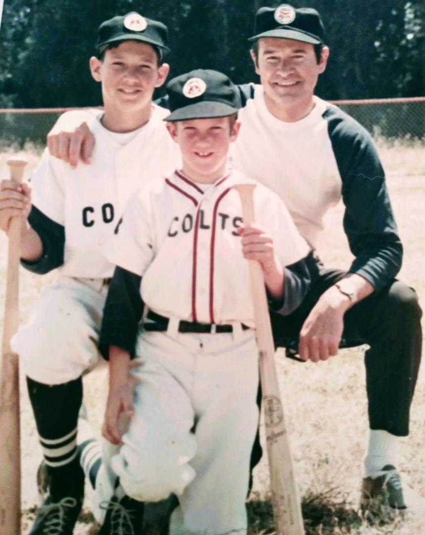 Dad's favorite American pass time. Watching his boys play ball. Love and miss you