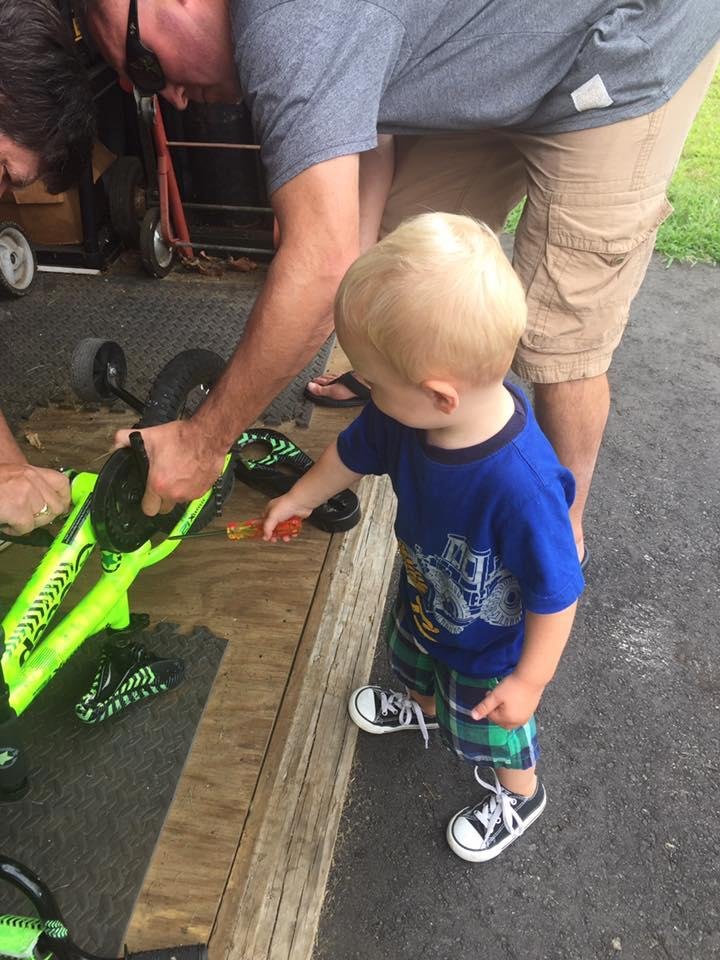 Helping Uncle Ben fix a bike