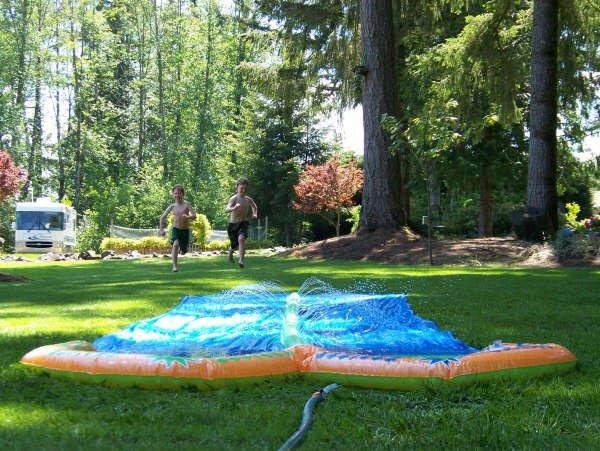 Grandson's Jacob and Hunter cooling off during the Washington summer. Sequence photo's.