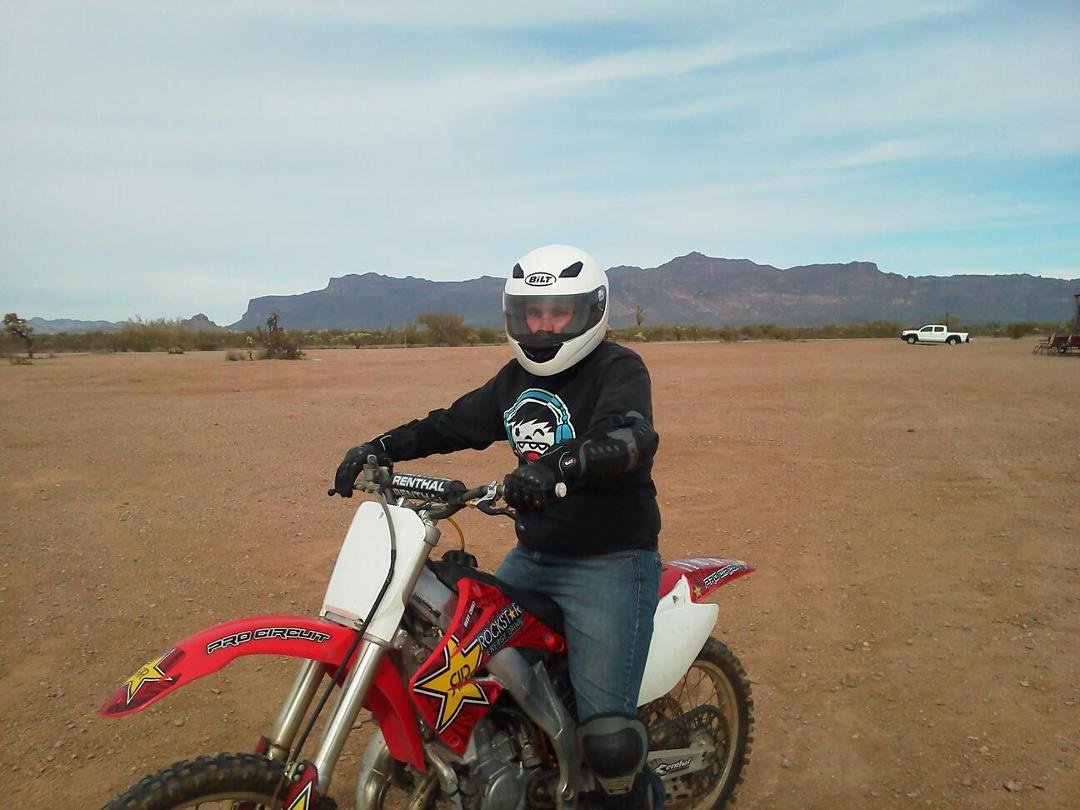 Matthew on his bike with Superstition Mountain in the background